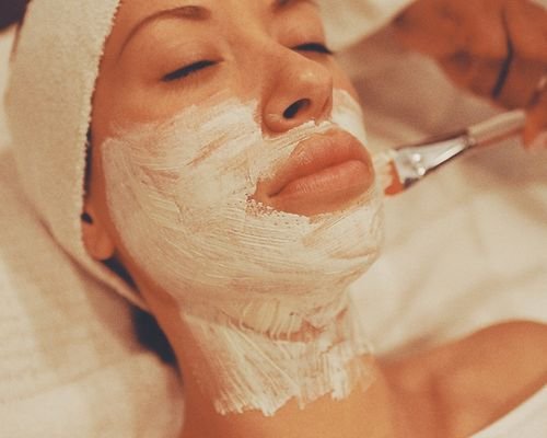 Woman receiving a chemical peel skin treatment at CFH